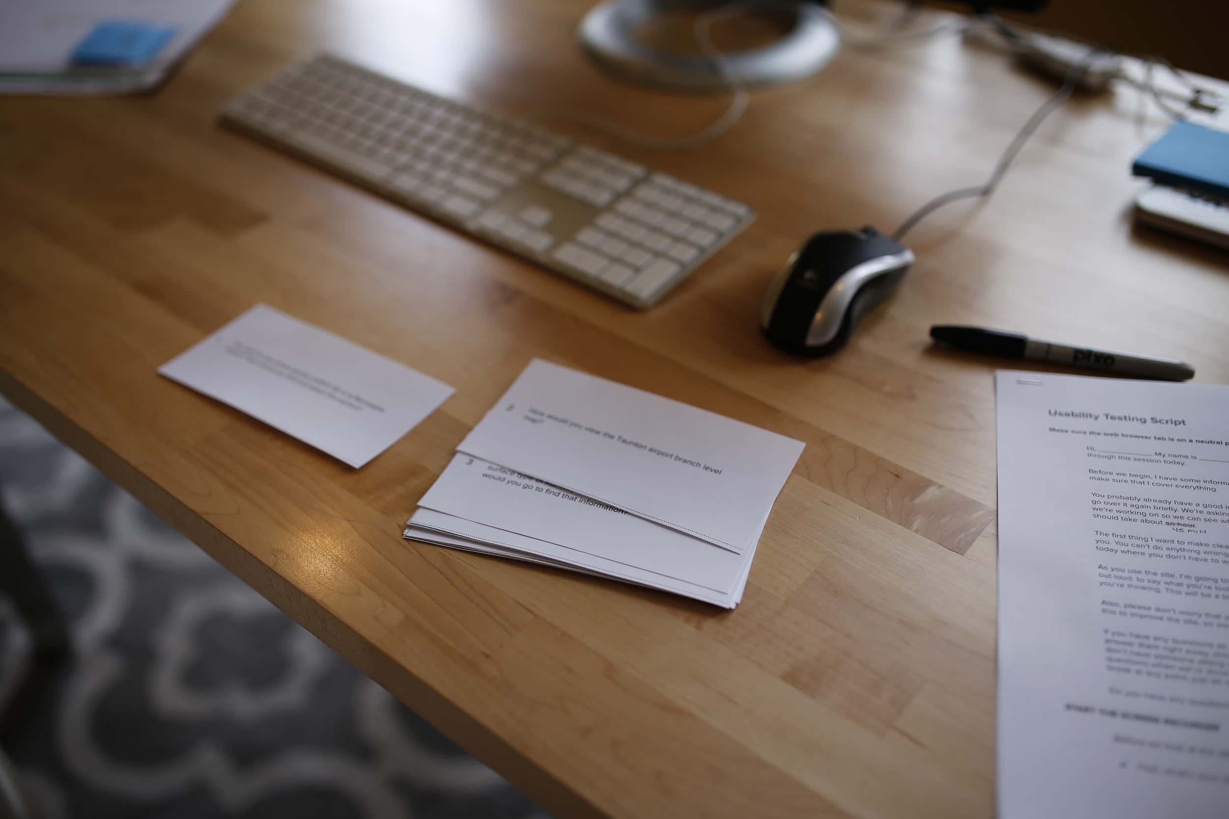 Slips of paper arranged on a desk
