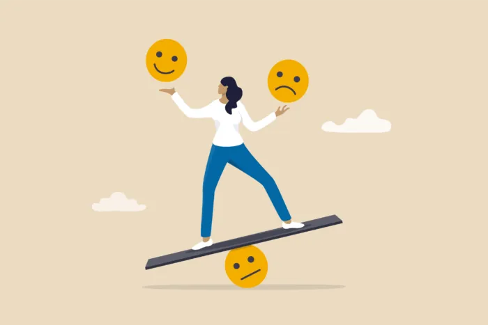 An illustrated woman holding a smiling face and a frowning face, balancing on a board with a fulcrum that's a neutral face