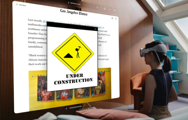 Woman wearing a mixed reality headset viewing the Los Angeles Times website with an under construction pop-up