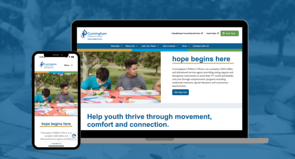 screenshots of the Cunningham Children's Home website displayed on a smartphone and laptop