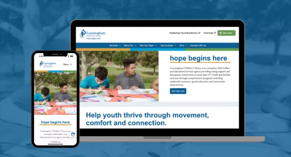 screenshots of the Cunningham Children's Home website displayed on a smartphone and laptop