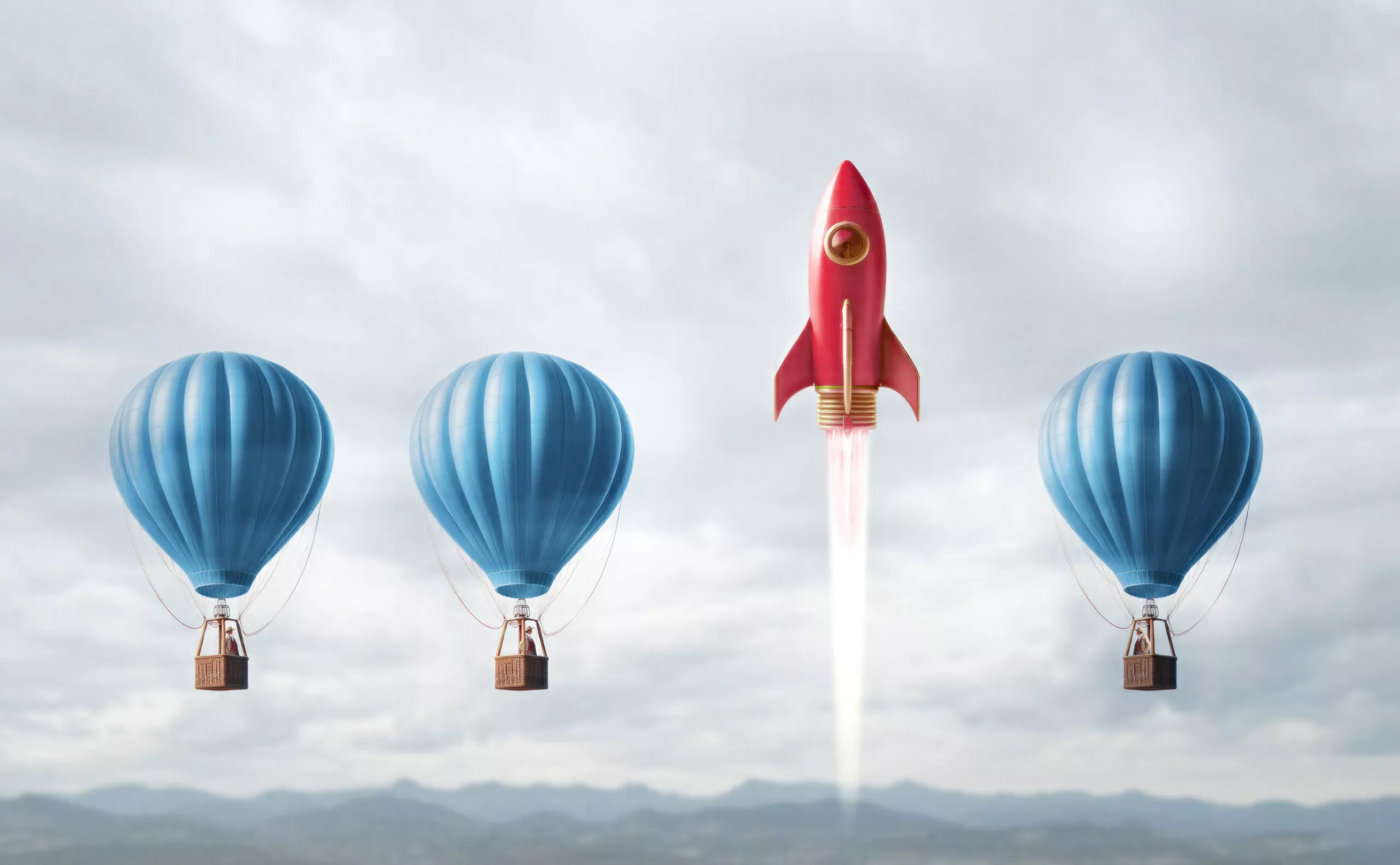 Three hot air balloons all at the same height and one rocket ship that is blasting off higher than the balloons.