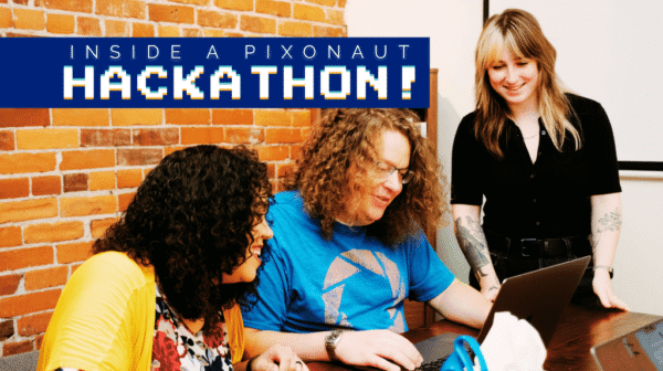Three Pixo team members gathered around a laptop and smiling, with text 
